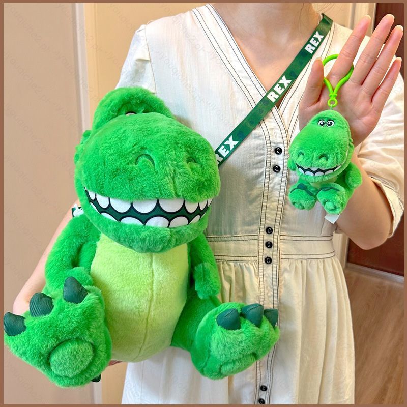 SY2 Disney Toy Story ไดโนเสาร์ Rex ตุ๊กตาตุ๊กตากระเป๋าสะพายของขวัญสําหรับสาวเด็กกระเป๋าจี้ตุ๊กตาของเ