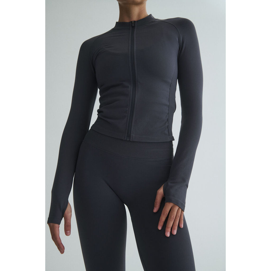H&M(เอชแอนด์เอ็ม) เสื้อแจ็กเก็ตสปอร์ตไร้ตะเข็บ พร้อมเทคโนโลยี DryMove™ Women Seamless Sports Jacket 1315698_1