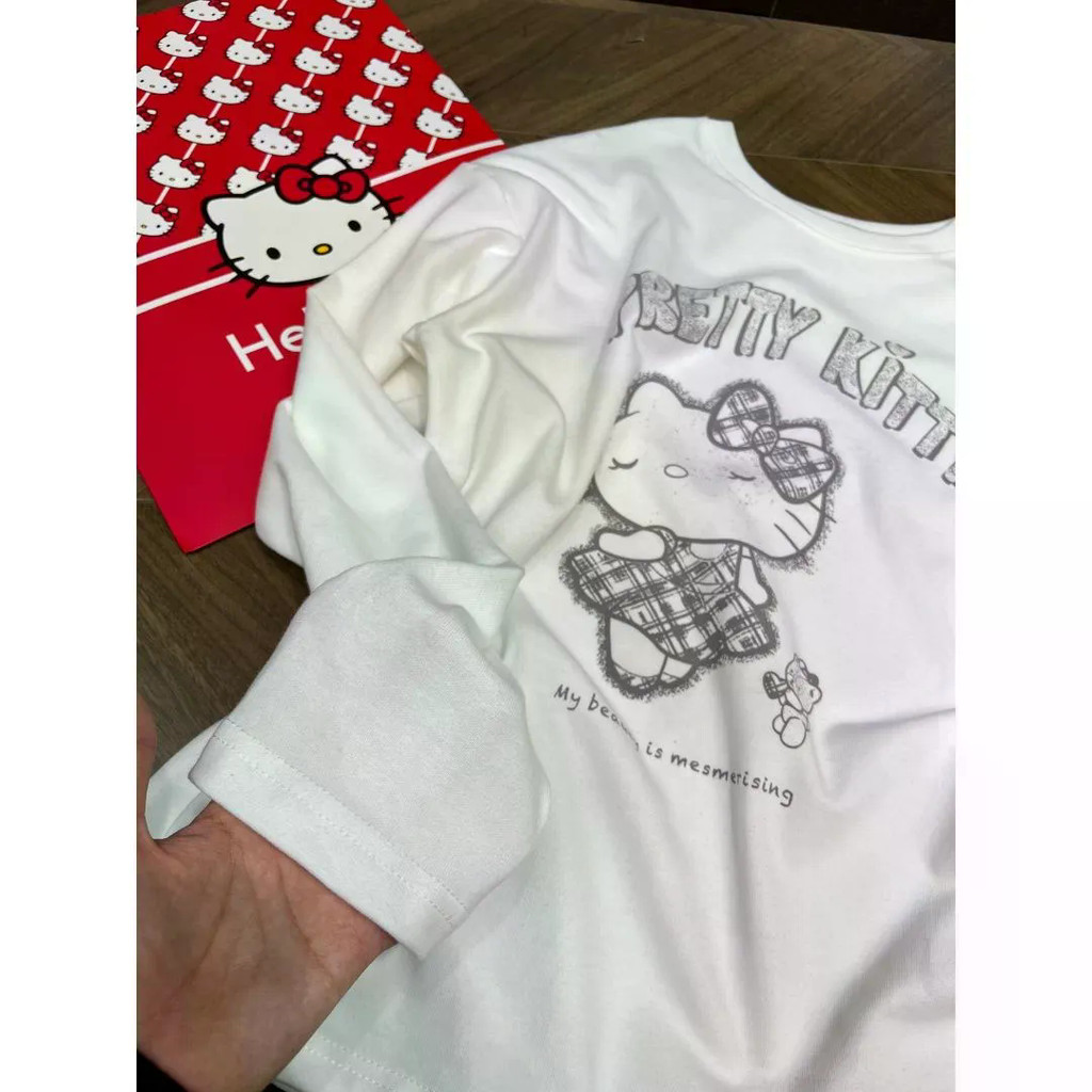 เสื้อยืดแขนยาวสำหรับผู้ชายและผู้หญิง ทำจากผ้าฝ้ายแท้อเมริกัน พิมพ์ลายการ์ตูนแบบหลวมๆ