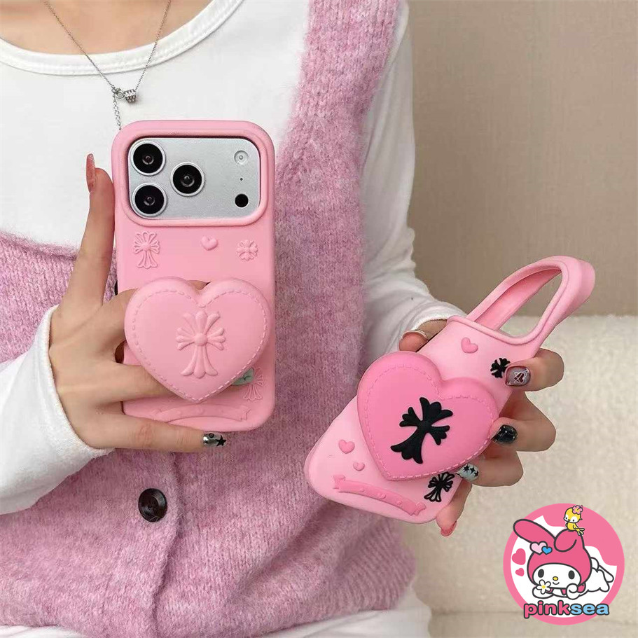 Ins 3D สีชมพู Cross Love ขาตั้งเคสโทรศัพท์สําหรับ iPhone 17 16 15 14 13 12 Pro Max แฟชั่นสาวกันกระแทกซิลิโคนอ่อนนุ่มเคสป้องกัน