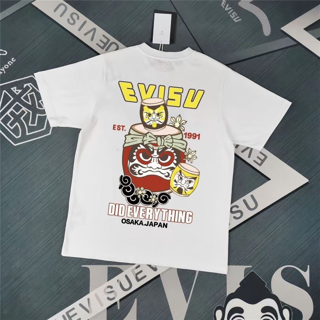 EVC High Street Wear แนวโน้มแฟชั่นล่าสุดสำหรับผู้ชาย Taiko Dharma ออกแบบสบาย ๆ กระดุมรอบคอมีแขนสั้นเ