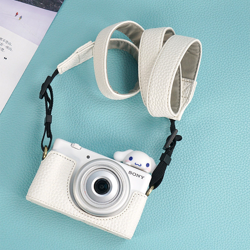 เหมาะสําหรับ SONY zv1f กระเป๋ากล้อง SONY ZV1 เคสหนังป้องกัน zv1m2 น่ารักฐาน Crossbody Lanyard อุปกรณ