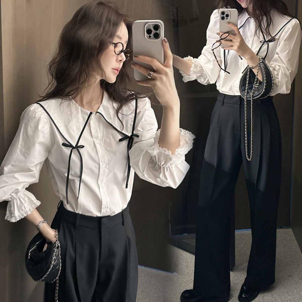 Black#เสื้อเชิ้ตแขนยาวสีขาวคอปกปีเตอร์แพนสไตล์ฝรั่งเศสสำหรับผู้หญิง คอลเลคชั่นฤดูใบไม้ผลิปี 2026 พร้อมโบว์ผูก รุ่น99357