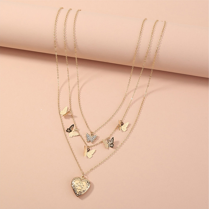 สร้อยคอชุบทอง: จี้หัวใจผีเสื้อที่สวยงามพร้อมลูกบาศก์เซอร์โคเนียแวววาว (CZ) ดีไซน์เรียบง่ายและทันสมัย