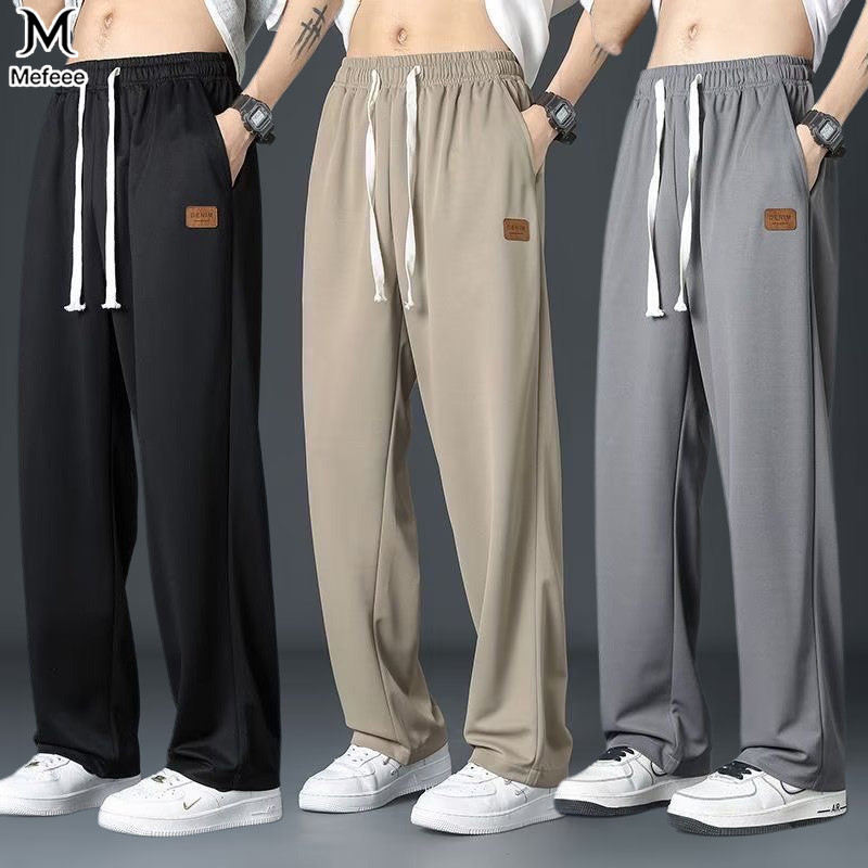 MEFEEE ผู้ชายผ้าไหมน้ําแข็งกางเกงหลวมสไตล์เกาหลี Baggy ขาตรงกางเกงลําลอง M-5XL สีดําสีกากีสีเทา