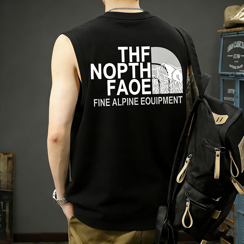 COD💯จัดส่งจากกรุงเทพฯ💯เสื้อแขนกุด พิมพ์"THE NOPTH FAOE" เสื้อกั๊กแขนกุดชาย ฝ้าย100% อเมริกันย้อนยุค สวมใส่สบาย แฟชั่น S-3XL OVERSIZE