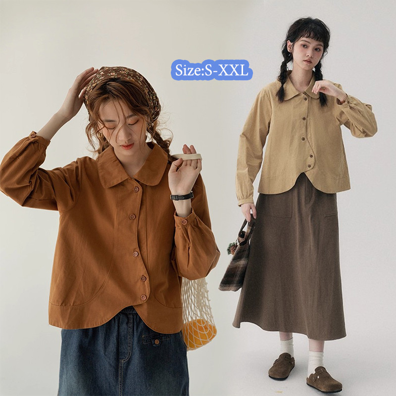 99201เสื้อเชิ้ตสไตล์ย้อนยุคสำหรับผู้หญิงตัวใหม่นี้มีคอปกปีเตอร์แพนทรงไม่สม่ำเสมอและเหมาะสำหรับการสวมใส่ในฤดูใบไม้ร่วง