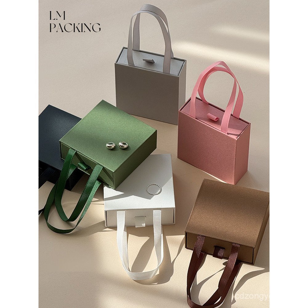 กล่องกระดาษแบบดึงออกแบบพกพากล่องบรรจุภัณฑ์เครื่องประดับสร้อยคอแหวนต่างหูกล่องเก็บกล่องของขวัญสีทึบพิ