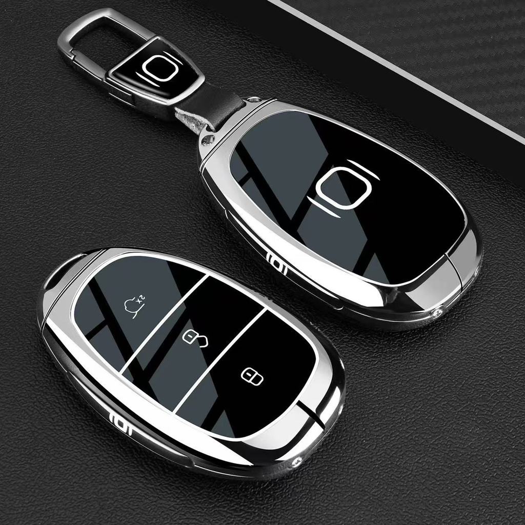 2026 NEVO Q05 ฝาครอบกุญแจ 25/2025 รุ่น A07 สไตล์ใหม่ 2026 NEVO Q05 กระเป๋ารถหัวเข็มขัดการปรับเปลี่ยน Shell