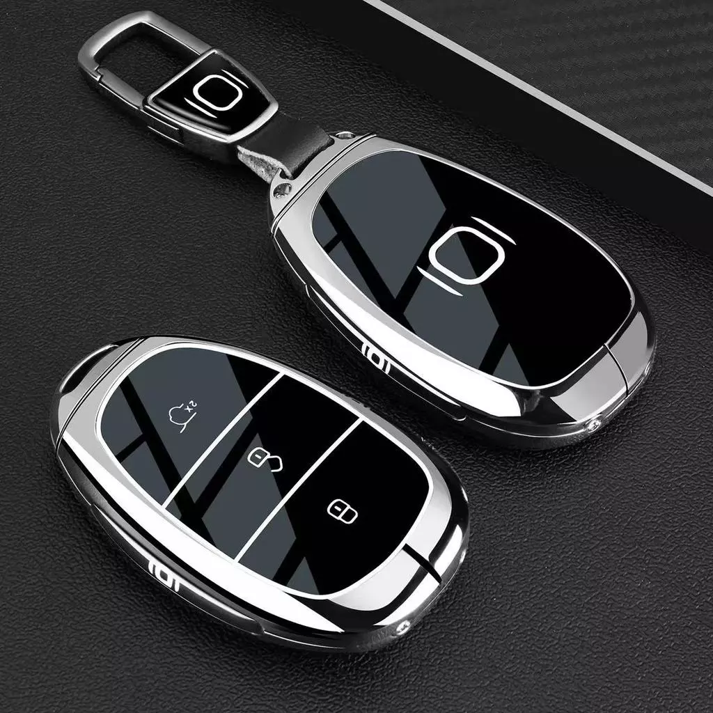 2026 NEVO Q05 ฝาครอบกุญแจ 25/2025 รุ่น A07 สไตล์ใหม่ 2026 NEVO Q05 กระเป๋ารถหัวเข็มขัดการปรับเปลี่ยน Shell