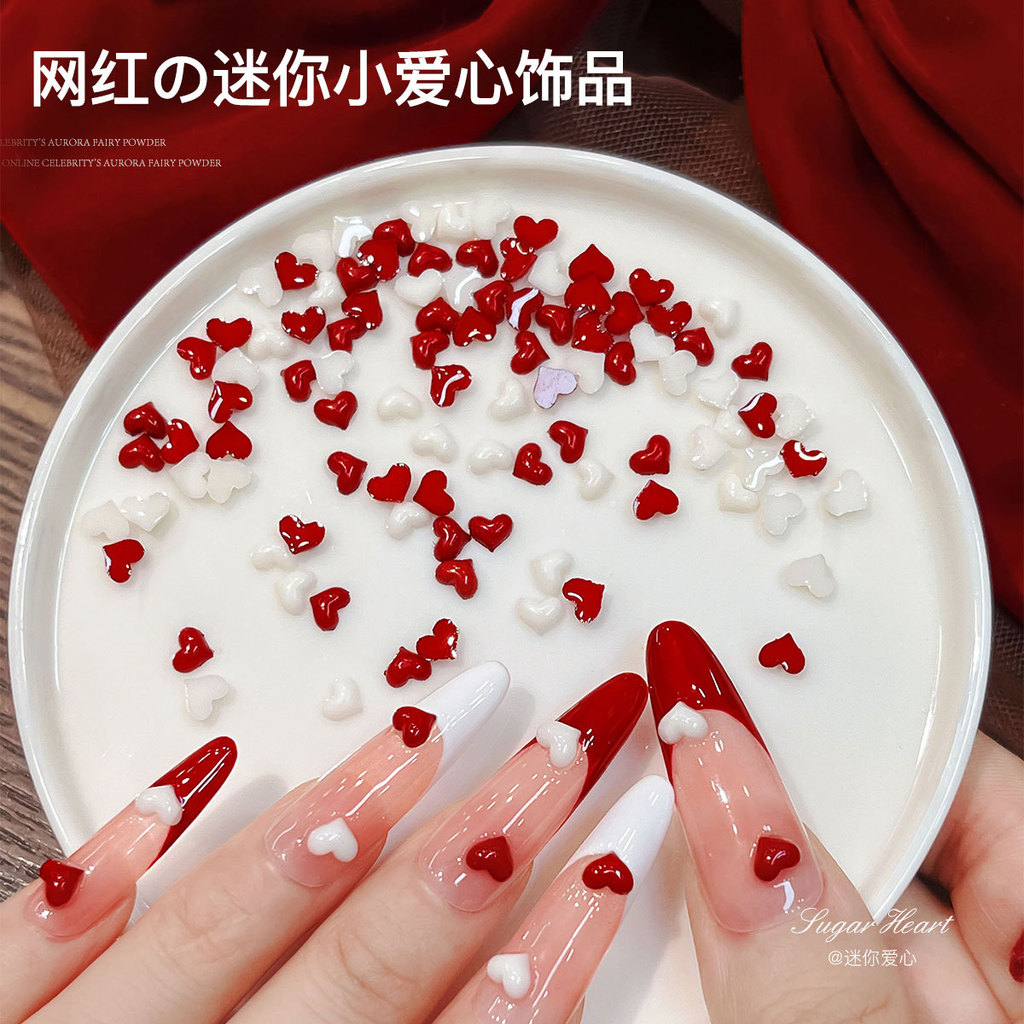 50 ชิ้นสไตล์ใหม่ Influencer Mini Small Love อุปกรณ์แต่งเล็บหวาน All-Match Little Peach Heart เรซิ่นเพชรตกแต่งเล็บ