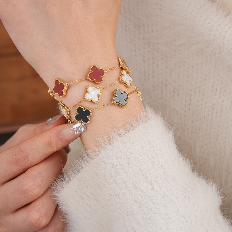 Drejew โลหะทองโคลเวอร์สี่ใบรูปสร้อยข้อมือโซ่แฟชั่นสตรีการออกแบบเฉพาะเครื่องประดับมือ S029