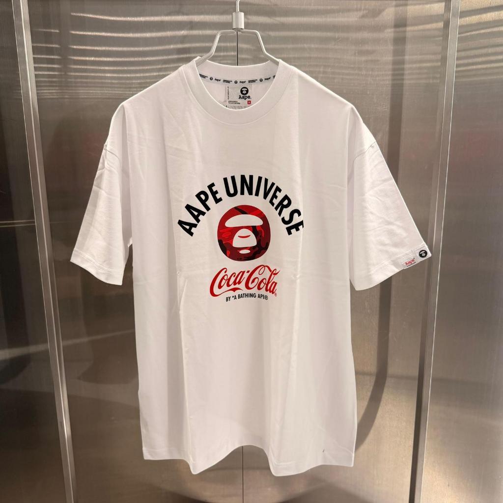 COCA COLA Hong Kong Daigou Counter ของแท้ 26 ฤดูใบไม้ผลิฤดูร้อน Aape ชาย COCA-COLA (OCA-COLA) Co-Bra