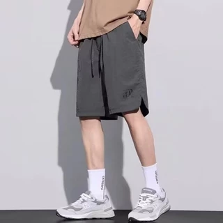 กางเกงขาสั้นผู้ชายแฟชั่นเกาหลีกีฬาเอวยางยืดสามสีตัวเลือก