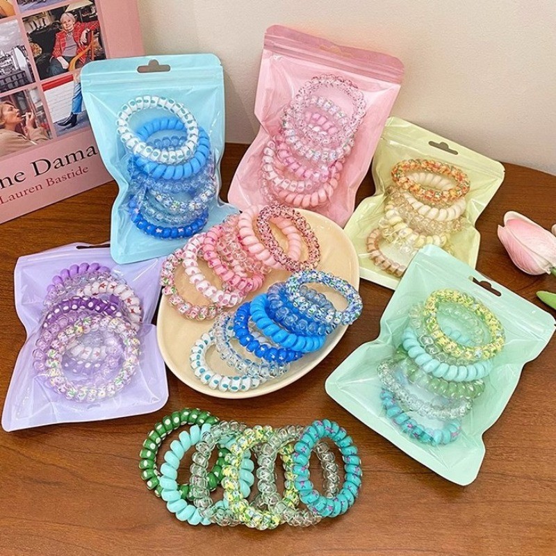 ยางรัดผมสายโทรศัพท์สีไล่โทน สีลูกอมหวานซ์ ไม่ทำร้ายผมไร้รอยต่อ