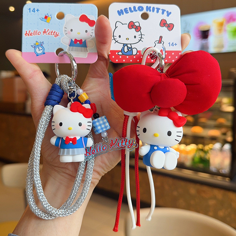 ของแท้ Hello Kitty Red Bow สร้อยข้อมือพวงกุญแจ/ตุ๊กตาน่ารักกระเป๋านักเรียนเครื่องประดับ