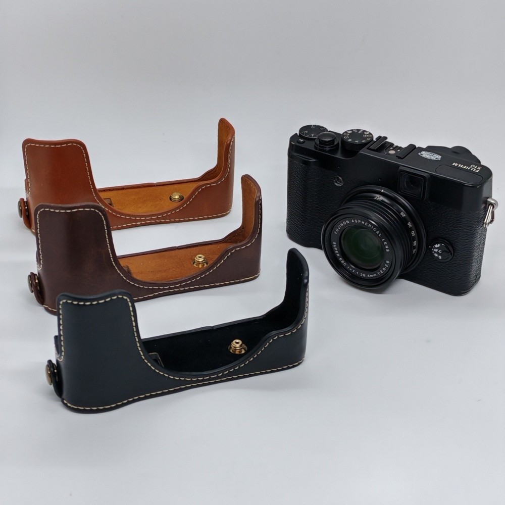 กระเป๋ากล้องหนัง PU สําหรับ Fujifilm X20 X10 x10 x20 ครึ่งฝาครอบป้องกันด้านล่างเปิด