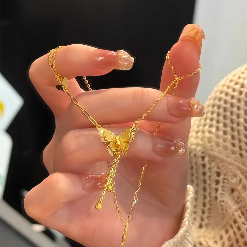 สร้อยข้อมือ 여성 พู่ผีเสื้อกระพริบ สไตล์จีนหรูหรา z56