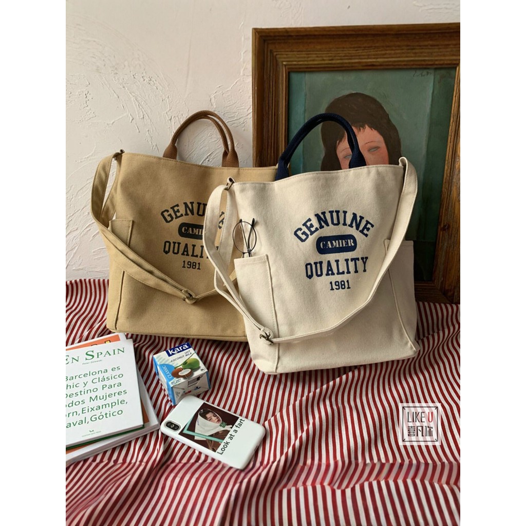 กระเป๋าผ้า gental women กระเป๋า gentlewom กระเป๋าเอกสารต้นฉบับ ทำจากผ้าใบหนา มีสายสะพายและซิปล็อกด้า