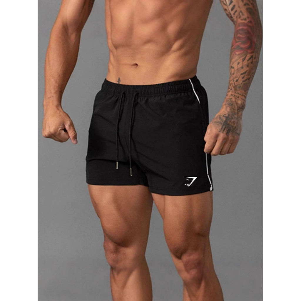 GYMSHARK ขาสั้นผู้ชาย แห้งไว ระบายอากาศดี เหมาะสำหรับการออกกำลังกายกลางแจ้ง