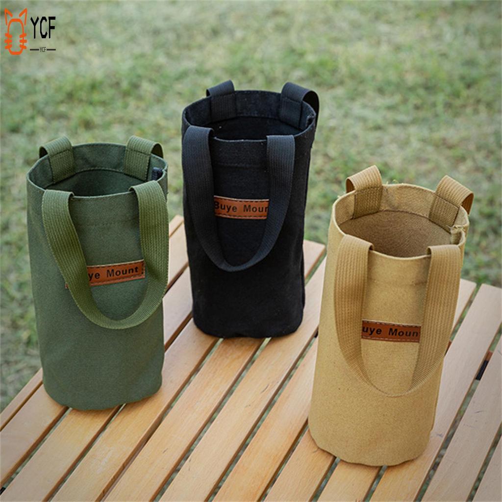 ผ้าใบที่วางแก้วกระเป๋าแบบพกพา Tote สําหรับกระติกน้ําร้อนขวดน้ําร่ม Universal อุปกรณ์เสริมกลางแจ้ง