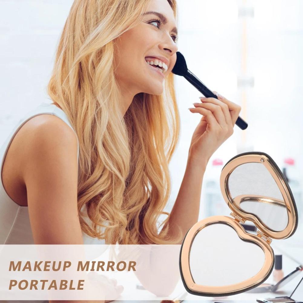 กระจกขนาดกะทัดรัดหัวใจสองด้านเครื่องสําอางกระจกขนาดกะทัดรัดสําหรับการขยายพับ B7k9