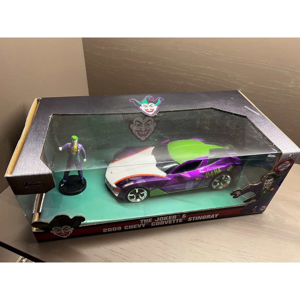((Bao SF Land Transport) ของเล่น Jada 1: 24 DC ชุดของเล่นธีมการ์ตูน รวมถึงตุ๊กตา Joker (The Joker) แ