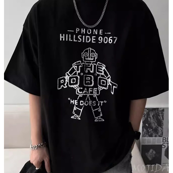 ผ้าฝ้าย 100% เสื้อผ้าผู้ชายหุ่นยนต์แขนสั้นเสื้อยืดอินเทรนด์รอบคอ All-Match เสื้อยืดแขนสั้นพิมพ์ผู้ชา