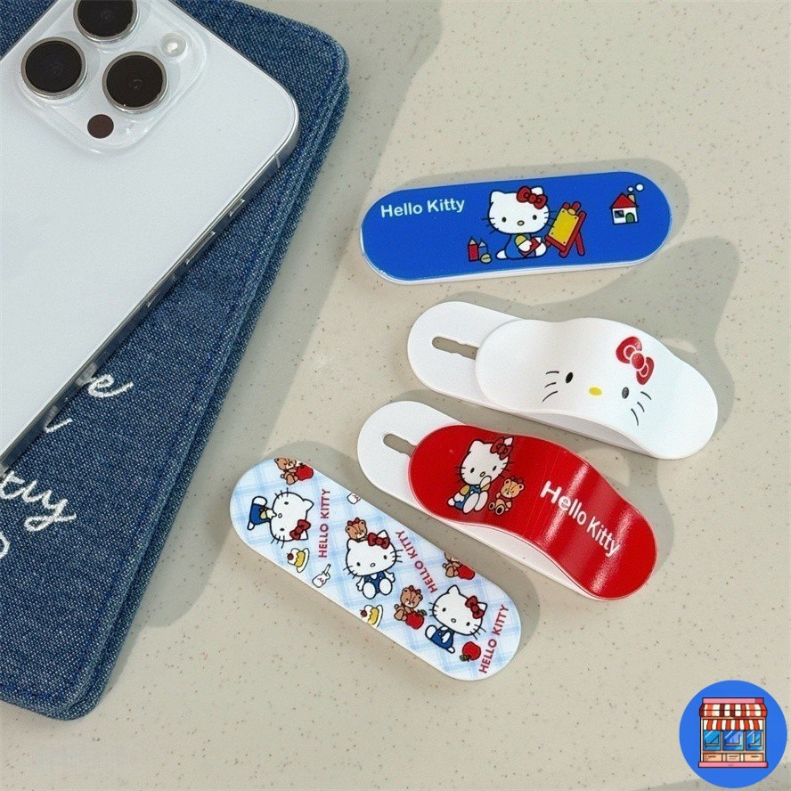 ขาตั้งติดเคสมือถือ จัดส่งทันที พกพาสะดวกจับมือเคส เลื่อนได้ การ์ตูนไฮโซ แมวเคธีน่ารัก ติดกาวที่วางได้ง่าย สะดวกวางแนวนอน