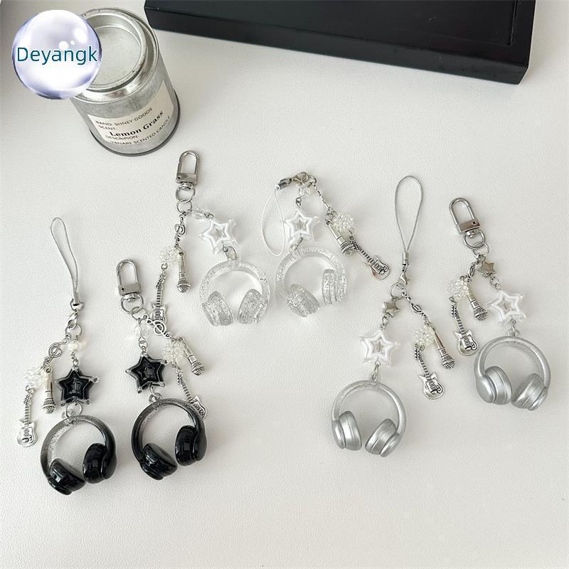 Deyangk น่ารัก Glitter หูฟังรูปพวงกุญแจ Star กีตาร์ไมโครโฟนจี้โทรศัพท์ Lanyard Girly Bapa Charms กระเป๋าแขวนของขวัญ TH ราคา ถูกที่สุด ดีลบีเคเค รูปภาพหลัก