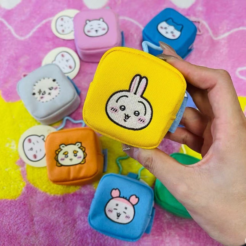 กระเป๋าใส่เหรียญทรงเหลี่ยม Jikawa พร้อมลายหูฟังและตัวคลิปลูกโลก