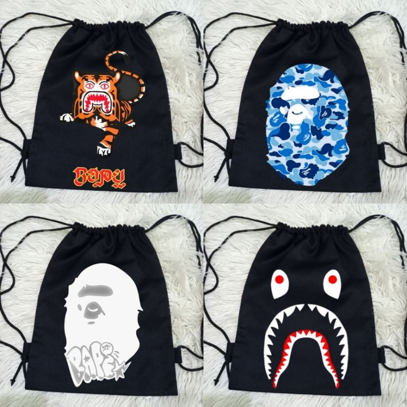 Bape Distro กระเป๋าหูรูดสีดําพรีเมี่ยมผ้าใบหนาวัสดุ Cool Bape Distro กระเป๋าหูรูดสีดํา/ Bape กระเป๋า