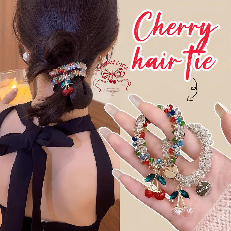 ยางมัดผม  ตกแต่งลูกปัดสีรุ้ง ชาร์มเชอร์รีสดใส  ออกแบบยืดหยุ่นสูง   ทนทานไม่หักเห ประดับด้วยป้ายโลหะ