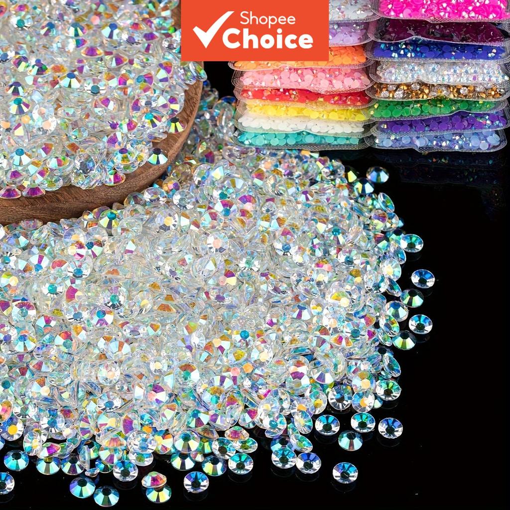 หินเพชรเทียมเพชรวิบวับแวววาวแบบหลวม โปร่งใส สีเจลลี่ใส เรซิ่นก้นแบนสําหรับตกแต่งเล็บ แก้วน้ํา ขวดน้ํา แก้วมัค ของตกแต่งงานฝีมือ ราคา ถูกที่สุด ดีลบีเคเค รูปภาพหลัก