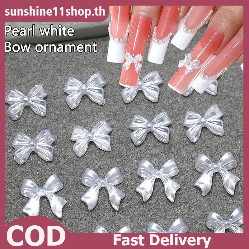 SUNSHOP 50 ชิ้นริบบิ้นสีขาวอะไหล่ริบบิ้นตกแต่งสําหรับเล็บ Charms แบน Ba เล็บตัวเลข Tie เรซิ่นสําหรับ DIY Charms อุปกรณ์แต่งเล็บ TH