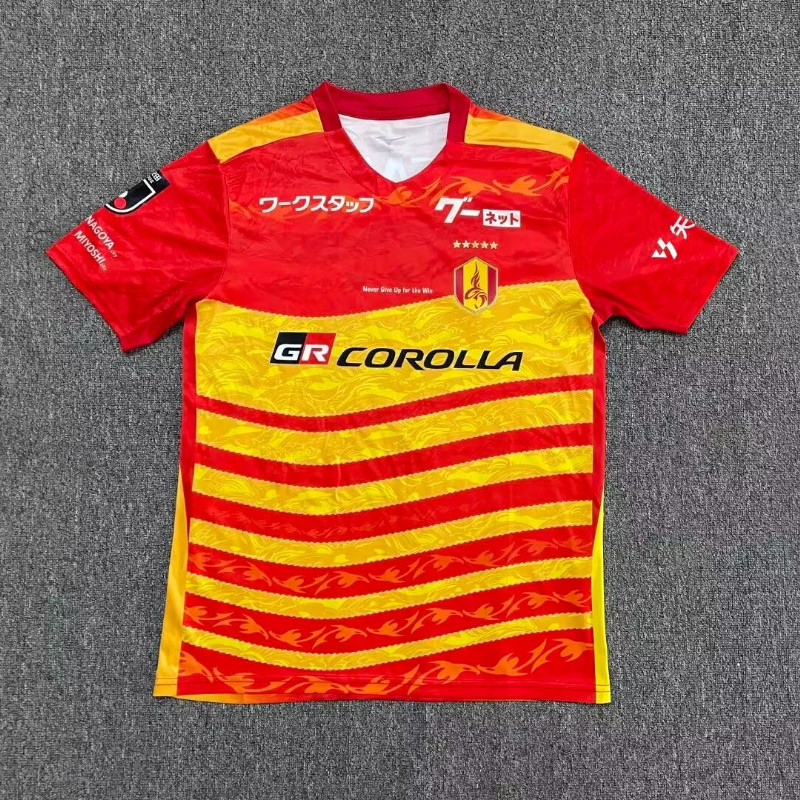 เสื้อฟุตบอลพัดลมสีส้ม Nagoya Grampus Home แห้งไว สวมไซส์ S-XXL