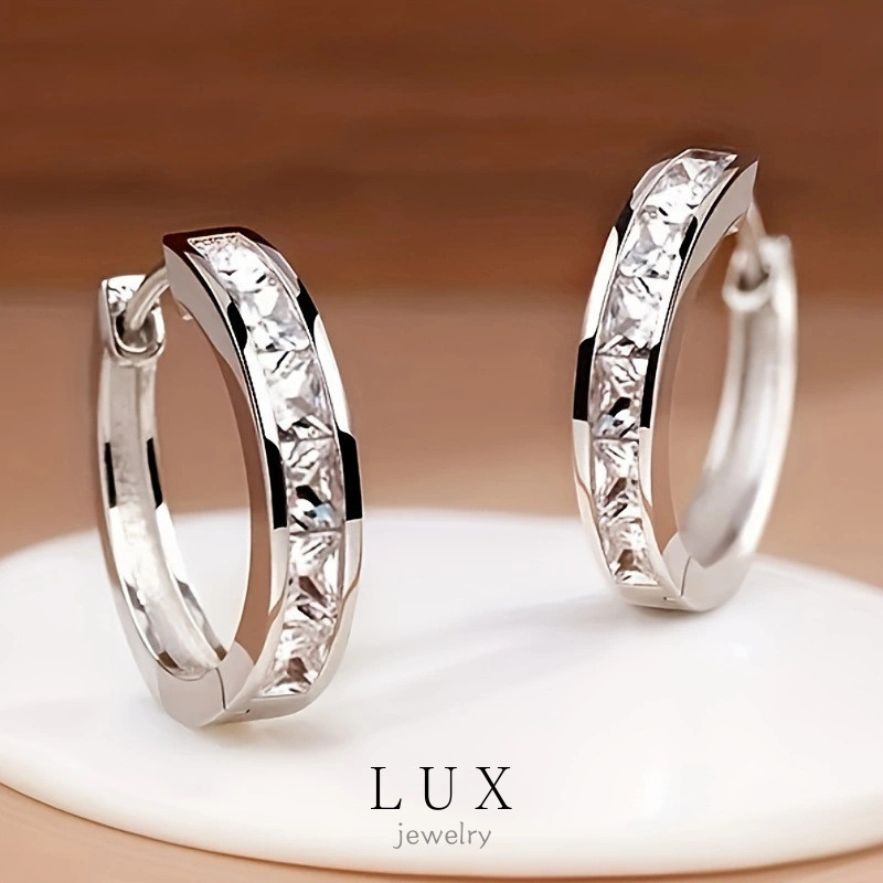 ชุดเครื่องประดับเงิน 925 สำหรับผู้หญิง ประกอบด้วยแหวนและต่างหู ไม่อันตรายต่อคนแพ้ง่าย ราคา ถูกที่สุด ดีลบีเคเค รูปภาพหลัก