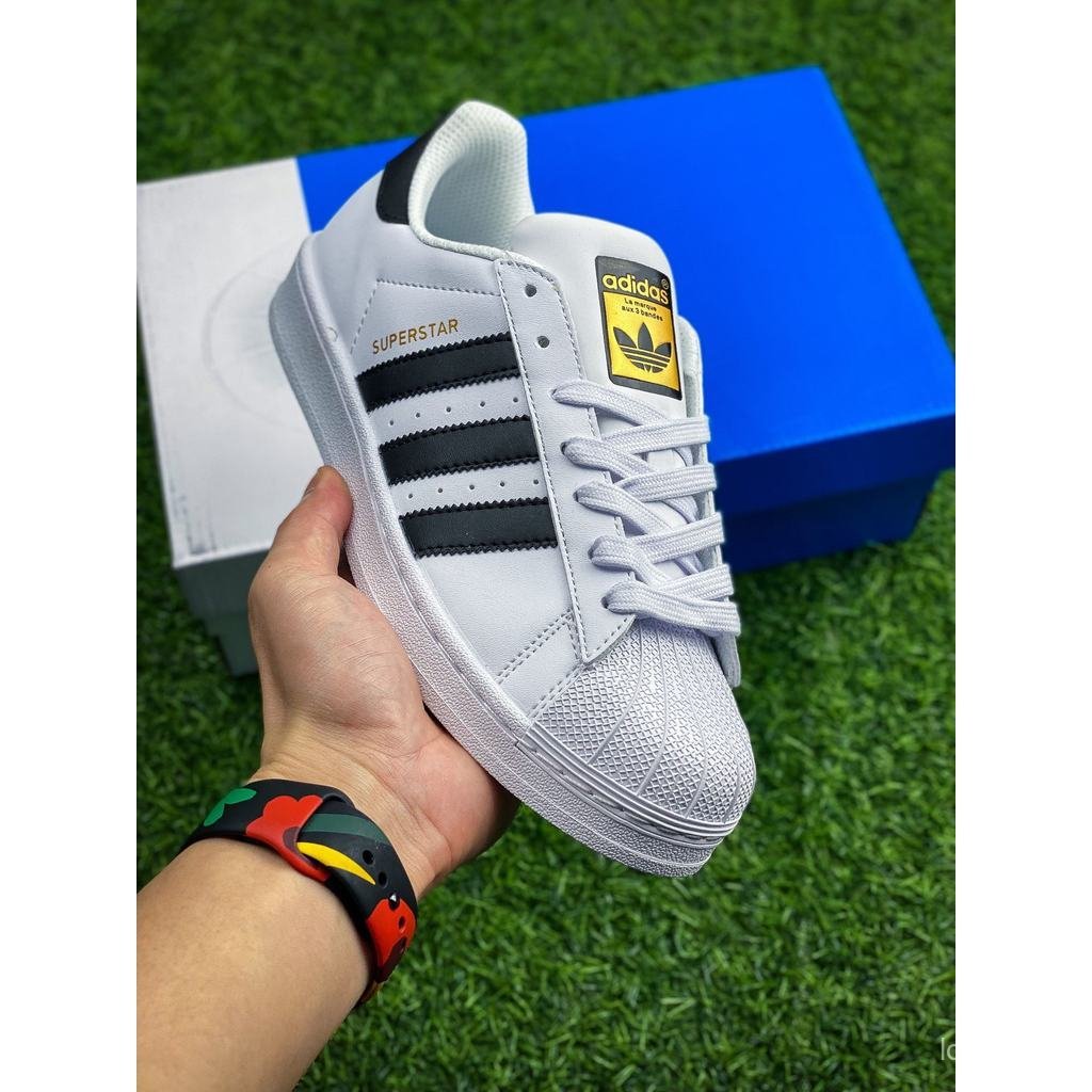 2026Adidas Originals Superstar ผู้ชายผู้หญิงรองเท้าผ้าใบรองเท้าคู่รองเท้าผ้าใบเยอรมันรองเท้าฝึกซ้อมส