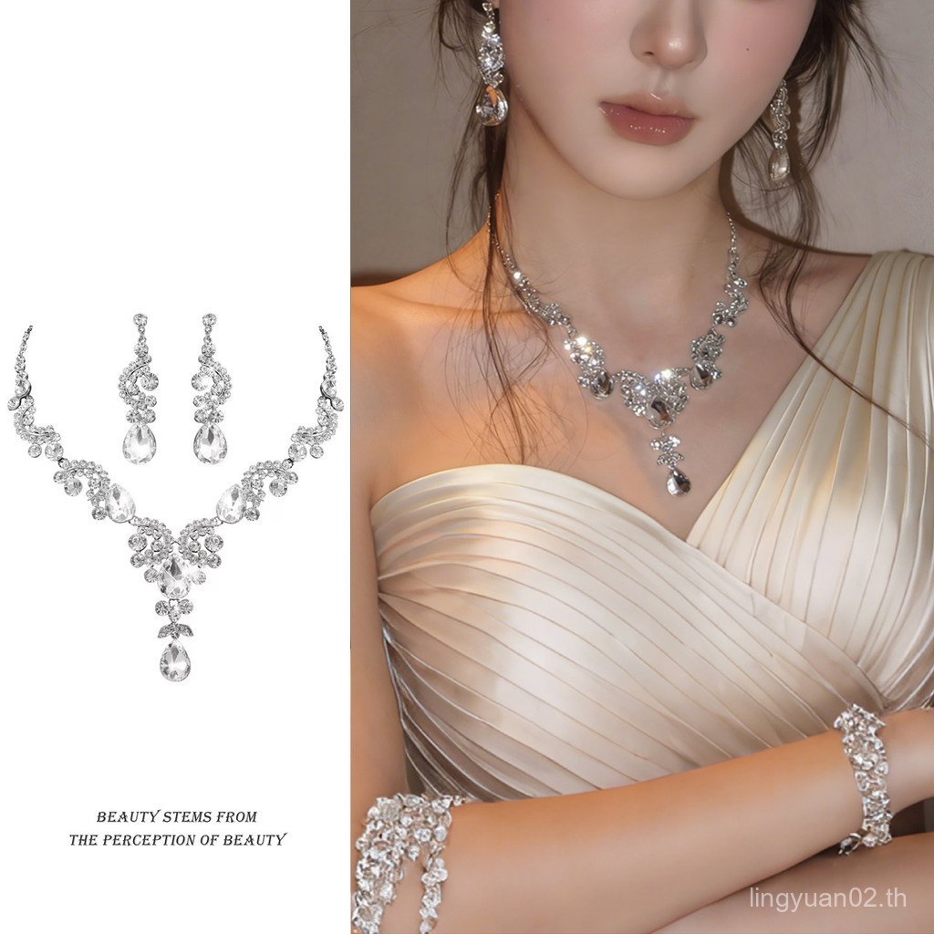 ซูเปอร์กระพริบเงินหยดน้ําพู่สร้อยคอความรู้สึกระดับไฮเอนด์ที่ดีงามแสงหรูหราต่างหูอาหารค่ําโอ้อวดเจ้าส