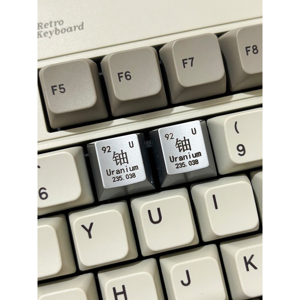 ใหม่ "Uranium 235 "เลเซอร์แกะสลักสังกะสีอลูมิเนียมอัลลอยด์ที่ไม่ซ้ํากันโลหะ Keycap Prank ที่กําหนดเอ