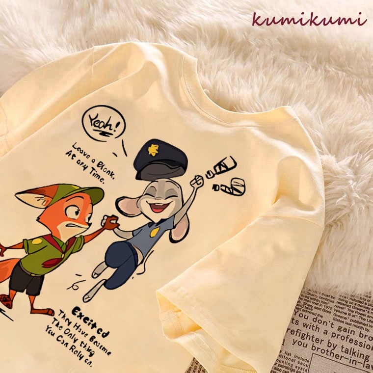 CODkumikumi เสื้อแฟชั่นเกาหลีคอกลมเสื้อยืดแอปริคอทสําหรับผู้หญิงขนาดใหญ่ Judy และ Nick printKorea CT