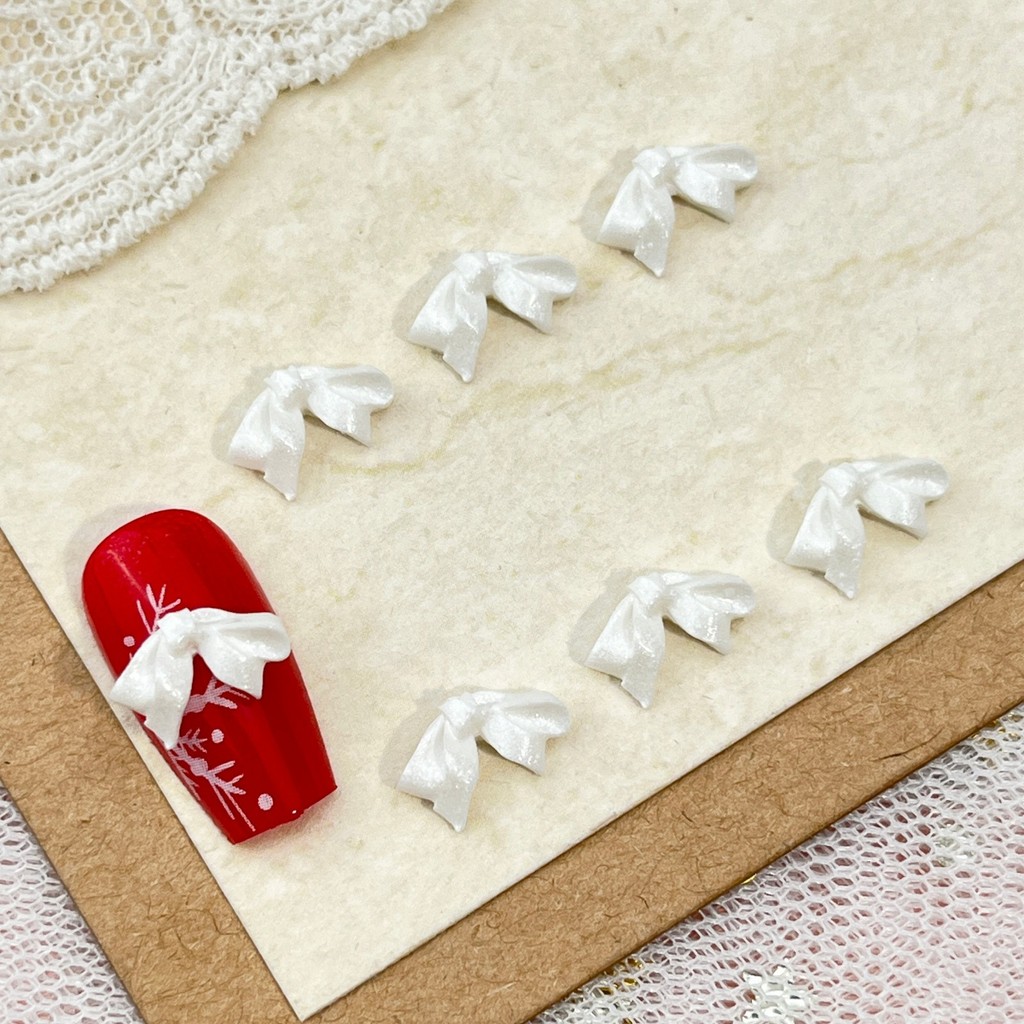 ใหม่นุ่มแกะสลัก Bowknot อุปกรณ์แต่งเล็บ All-Match Pearl White ซาตินริบบิ้น Bow Tie เรซิ่น diy อุปกรณ์ทําเล็บ ราคา ถูกที่สุด ดีลบีเคเค แกลเลอรีภาพที่ 9