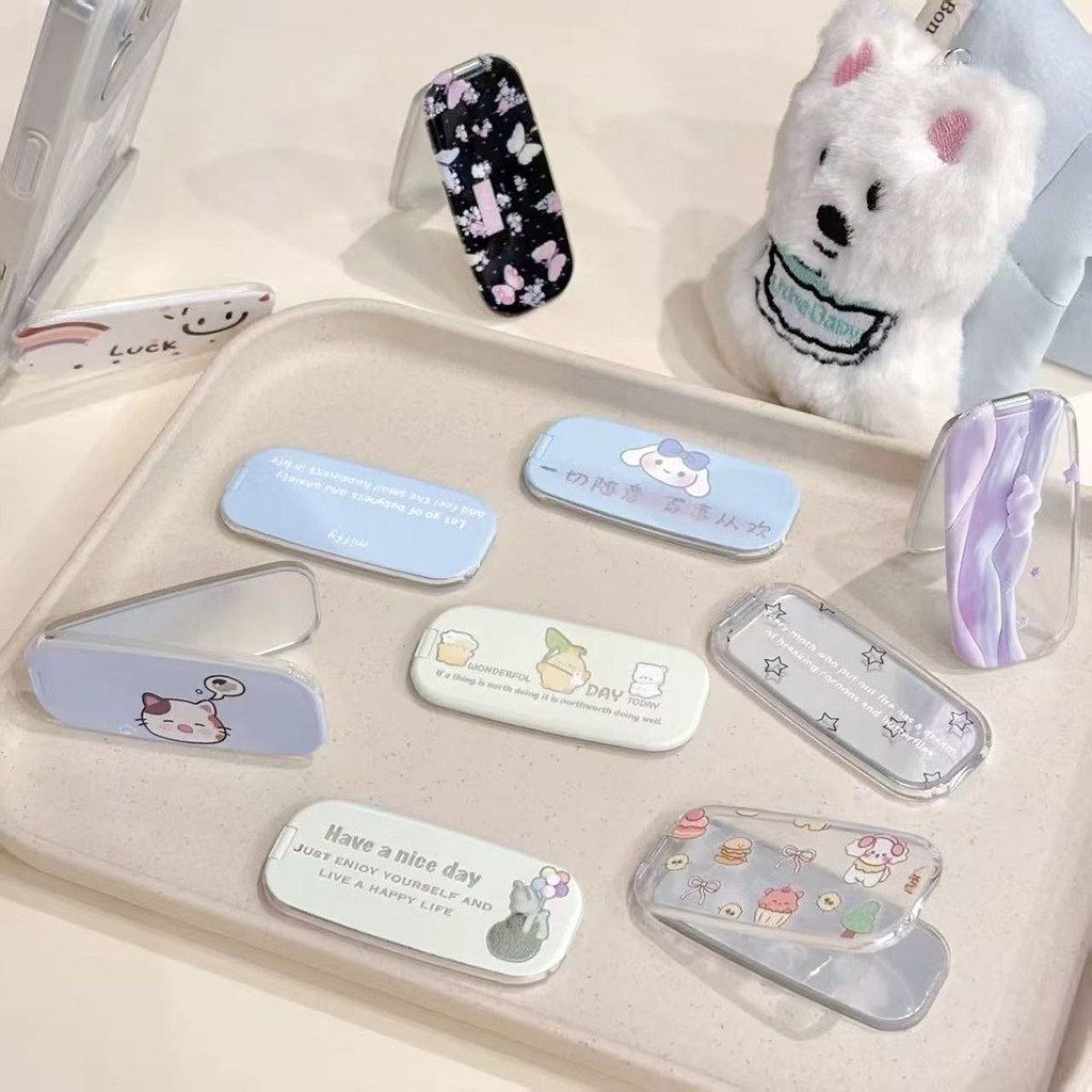🌸Well DIY🌸 การ์ตูนน่ารักพับได้กระจกโทรศัพท์ยืนยืดพับได้วางเดสก์ทอปเป็นการสนับสนุนสำหรับทุกชนิดของกรณีโทรศัพท์ 🌟 C23