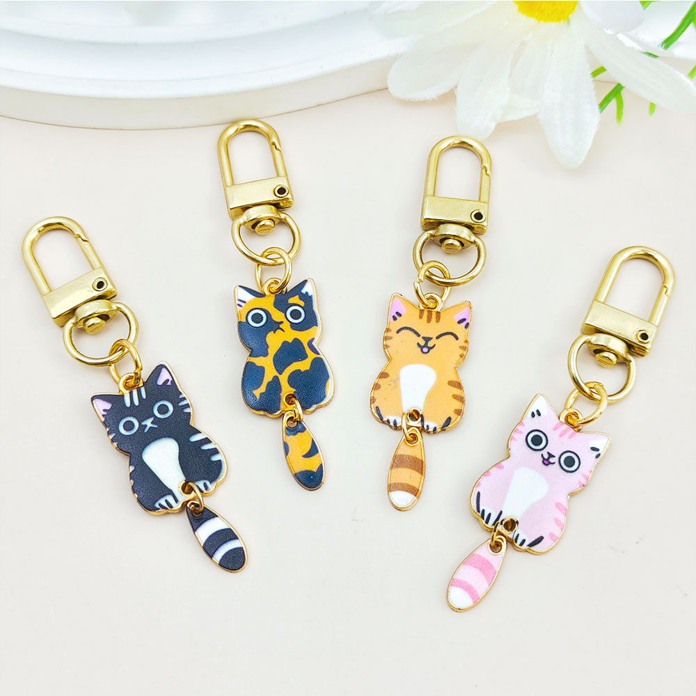 Kawaii Wagging Tail Cat Key แหวน Creative เคลือบลูกแมวโลหะพวงกุญแจหูฟังจี ้ กระเป ๋ าเครื ่ องประดับของขวัญของที ่ ระลึก