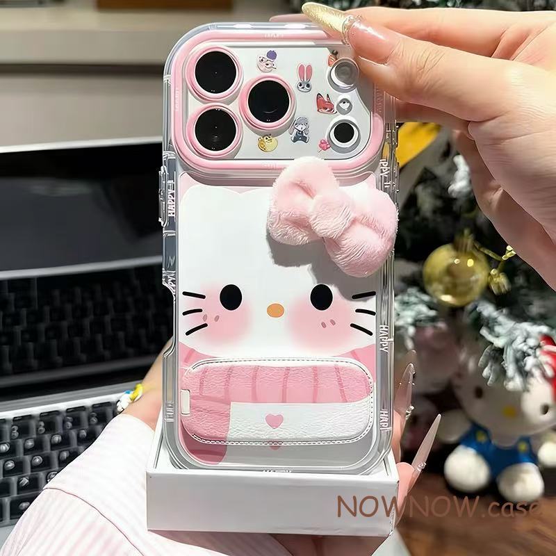 สําหรับIPhone 17 16 15 14 Plus 13 12 11 Pro Max X XR XS MAX 7 8 PLUSสีชมพูสาวหัวใจน่ารักKitty 3Dโบว์พัฟโต๊ะกระจกขาตั้งเคสโทรศัพท์ปกอ่อน