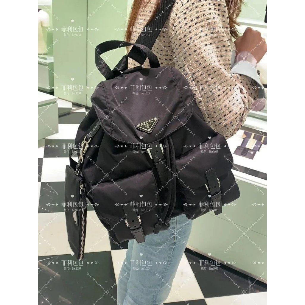 [Nide Bags] สินค้าใหม่ล่าสตี้ล pra saffiano กระเป๋าสะพายหลังและถือ สำหรับทั้งชายและหญิง รหัส 1BZ811 