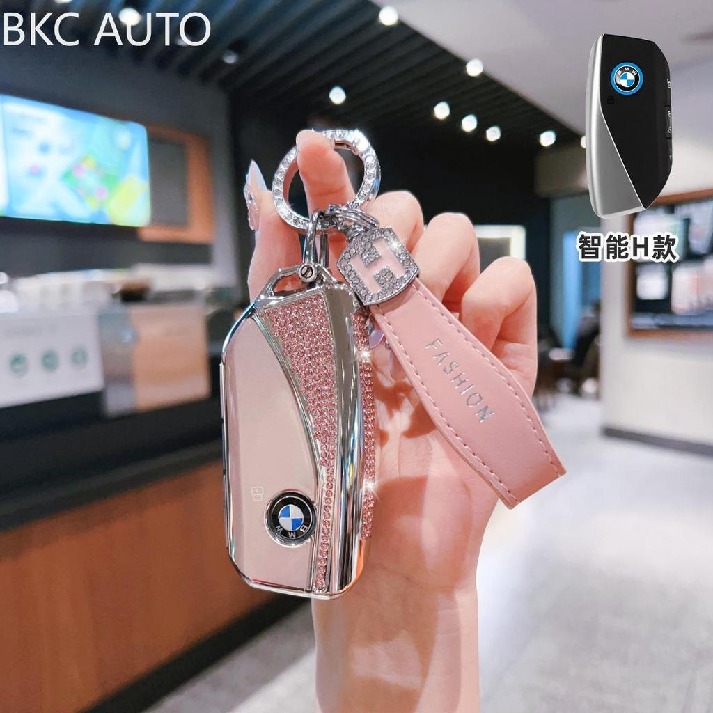 Diamond-encrusted Bow Car Key Fob Case สําหรับ BMW 1, 5, 7 Series, X6, X7, X1, X3, X5, XM, IX, G81, 