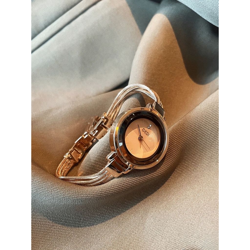 Xihuan นาฬิกาหญิง Niche Light หรูหรานักเรียนพู่ Retro อารมณ์ขนาดเล็กประณีตสร้อยข้อมือนาฬิกากันน้ํา