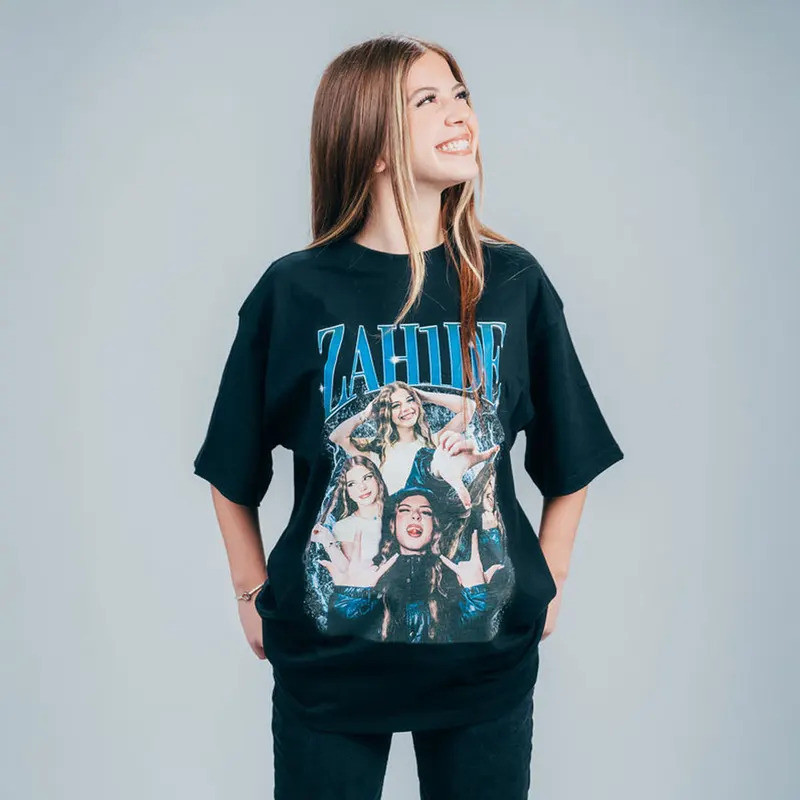 เสื้อยืดพิมพ์ลายกราฟิก Zahide Merch สำหรับผู้ชายและผู้หญิง แฟชั่นฮิปฮอป เสื้อยืดผ้าฝ้ายลำลอง ทรงโอเว