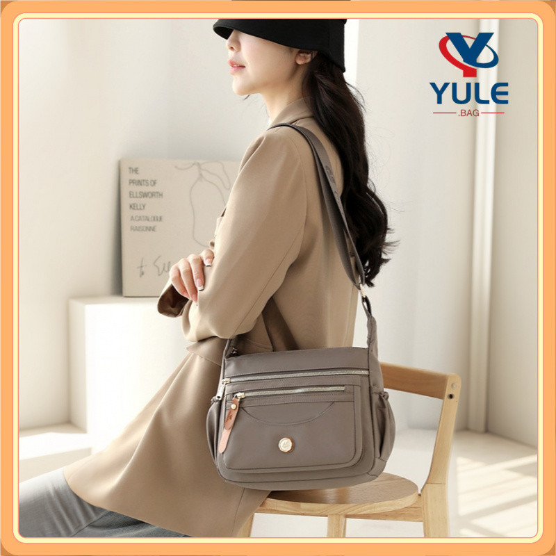 YULE หลายช่อง Crossbody Sling กระเป๋าสำหรับผู้หญิงกันน้ำไนล่อนความจุขนาดใหญ่ป้องกันการโจรกรรมกระเป๋าสะพายเดินทาง